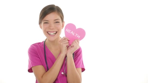 Healt care concept - Medical nurse showing heart — Stock Video