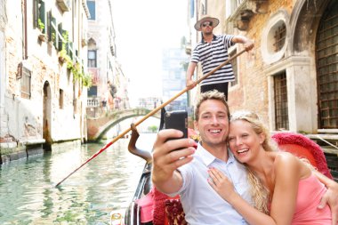 Couple in Venice on Gondole ride romance clipart