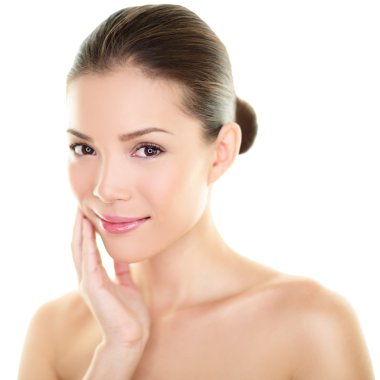 Asian beauty skincare woman touching skin on face clipart