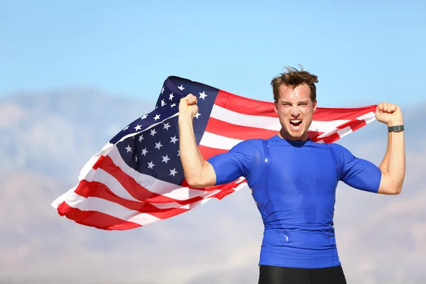 Atleta estadounidense de éxito ganador con bandera de EE.UU. — Foto de Stock