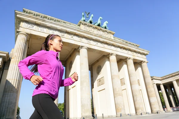 Running woman in Berlin, Germany — Stock Photo, Image