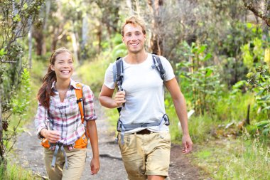 Outdoor activity couple hiking - happy hikers clipart
