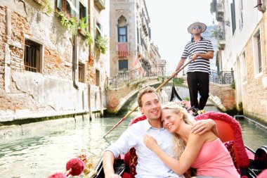 Romantic travel couple in Venice on Gondole boat clipart