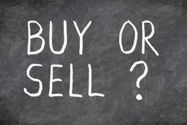 Buy or sell question on blackboard — Stock Photo, Image