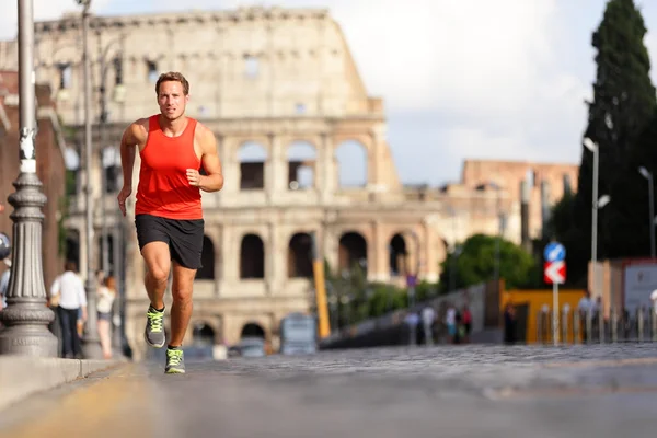 Running runner man by Colosseum, Rome, Italy — Stock Photo, Image