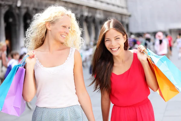 Women shoppers with bags, Venice Stock Image