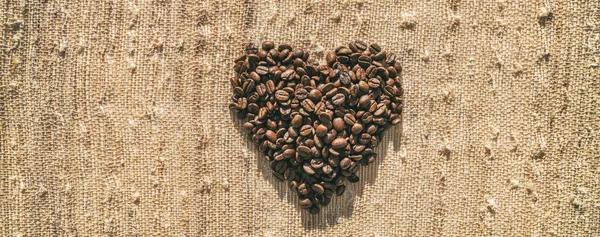 Coffee lover beans in heart shape header panoramic crop banner flat view. Cafe lifestyle espresso concept — Stock Photo, Image