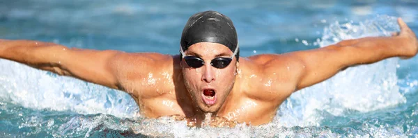 Apto atleta nadador natação acidente vascular cerebral borboleta na piscina. — Fotografia de Stock