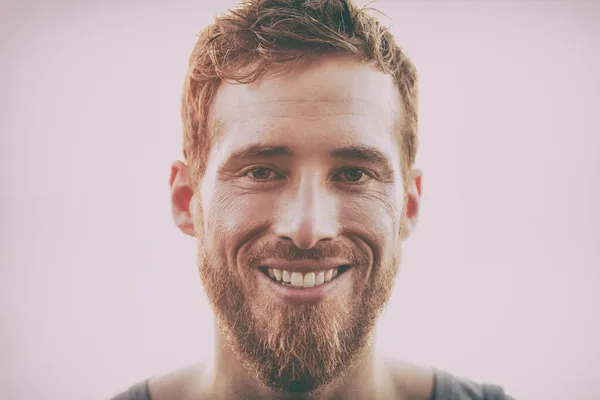 Smiling young happy man with beard - Hairstyle, hipster hair style bearded handsome healthy model. — Stock Photo, Image