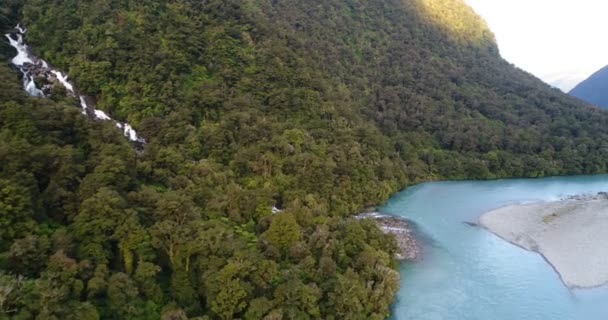 New Zealand nature landscape aerial drone video of Haast River and waterfall — Stock videók