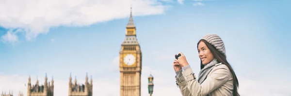 London europe travel woman taking pictures with phone panorama banner. Tourist holding smartphone camera taking photos at Big Ben, Westminster Bridge, London, England — Stock Photo, Image