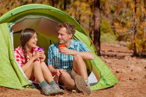 Camping Couple Drinking Water Tent Smiling Happy Outdoors Forest Enjoying — Stock Photo, Image