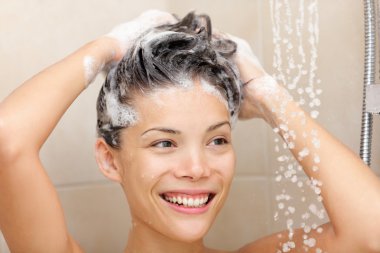Woman washing hair clipart