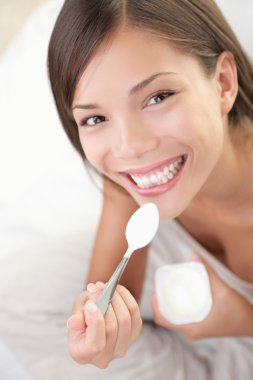 Yogurt woman eating clipart