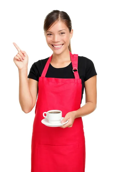 Servitrisen pekar anläggning kaffe — Stockfoto