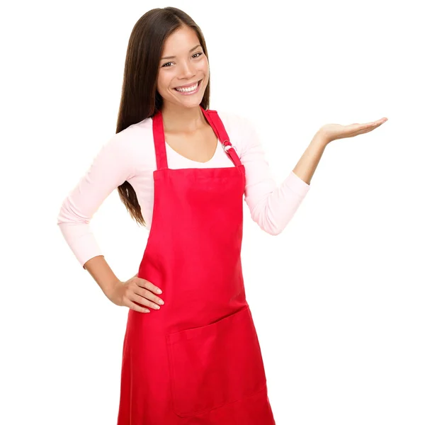 Small shop owner showing in apron — Stock Photo, Image