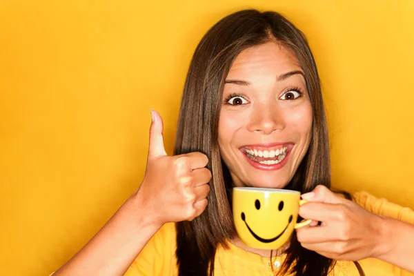 Woman drinking coffee happy thumbs up — Stock Photo, Image