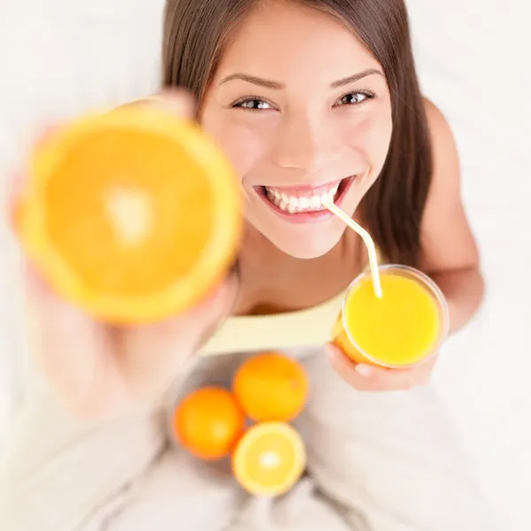 Orange juice drinking woman — Stock Photo, Image