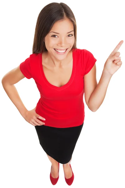 Apontando mostrando mulher sorrindo alegre — Fotografia de Stock