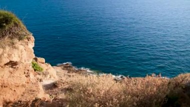 Panoramic view from the mountains going along the coast of the sea, high quality HD