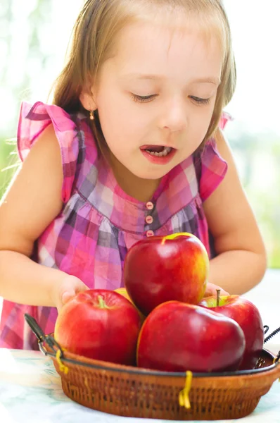 Child holding apples — Stock Photo, Image