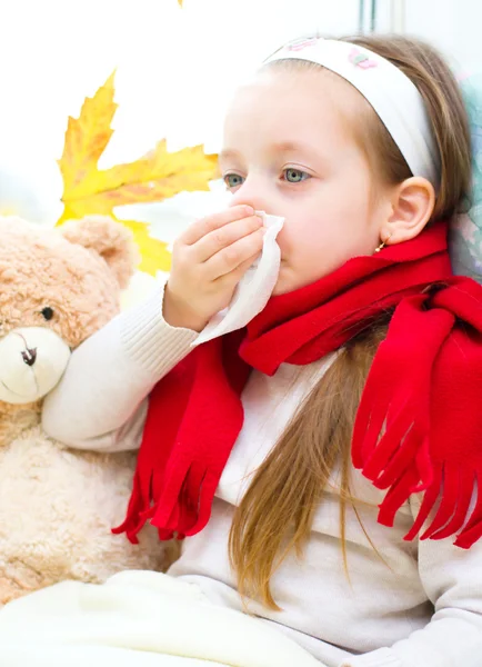 Little girl blowing her nose — Stock Photo, Image