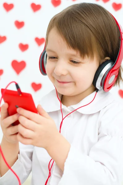 Kid listening to the music — Stock Photo, Image