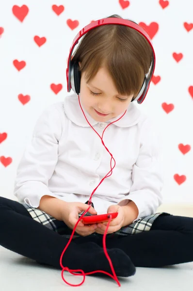 Kid listening to the music — Stock Photo, Image