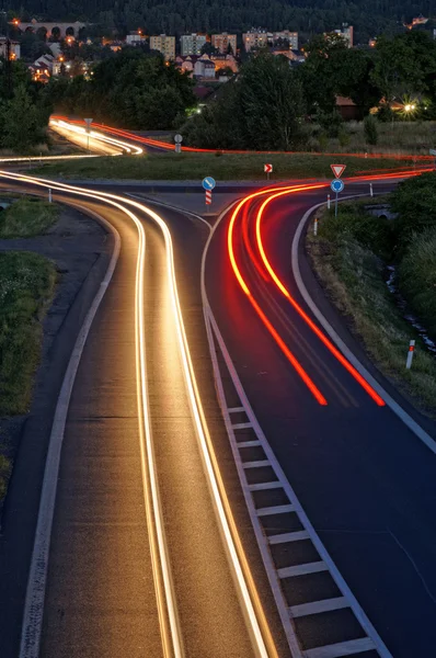 The road in the evening with light stripes headlights — Stock Photo, Image