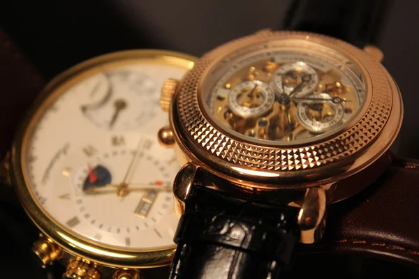 Two golden luxury chronometers (macro) — Stock Photo, Image