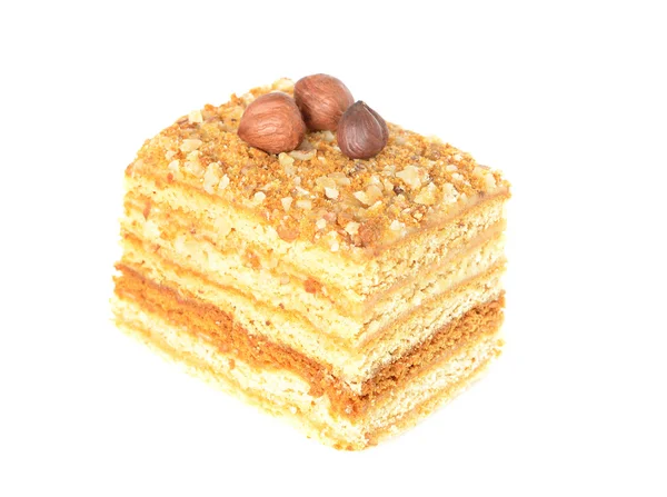 Honung kaka med nötter isolerad på vit — Stockfoto