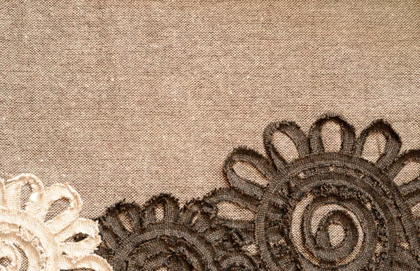 Brown fabric with flowers — Stock Photo, Image