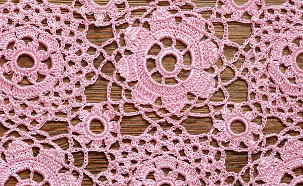 Crochet lace on a wood — Stock Photo, Image