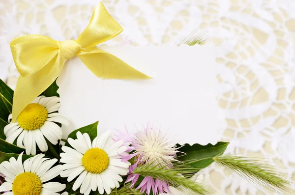 Bouquet with a card — Stock Photo, Image