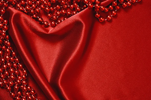 Draped in the form of heart with beads — Stock Photo, Image