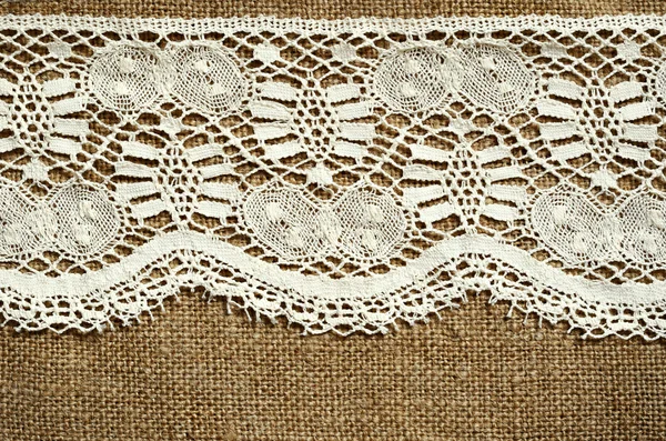 White lace on canvas — Stock Photo, Image