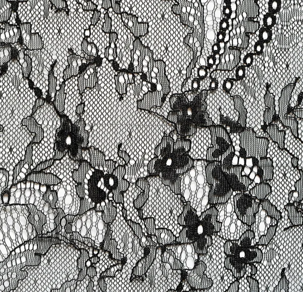 Black lace on white background — Stock Photo, Image