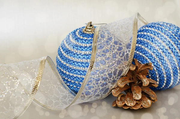 Blue christmass balls and pinecone — Stock Photo, Image