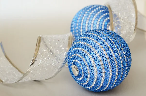 Blue Christmas balls and ribbon — Stock Photo, Image