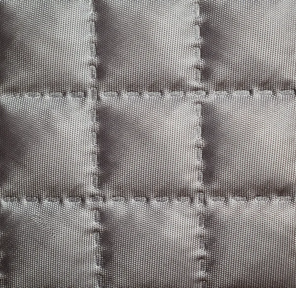 Closeup of quilted fabric — Stock Photo, Image