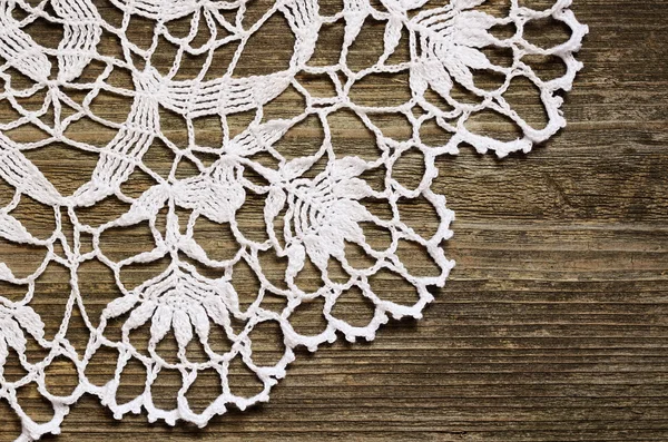 Lace on wood — Stock Photo, Image