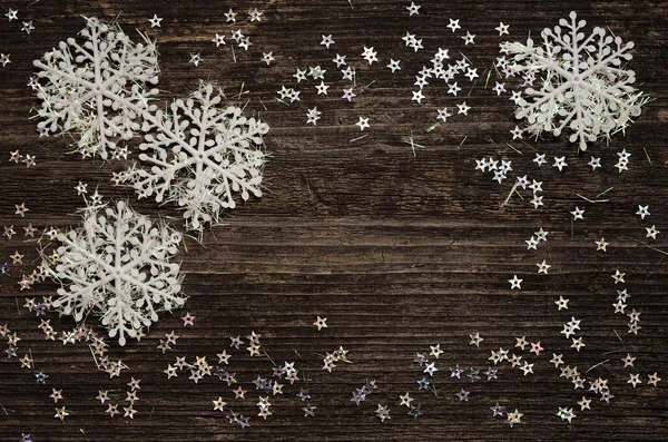 Snöflingor på grå bakgrund — Stockfoto
