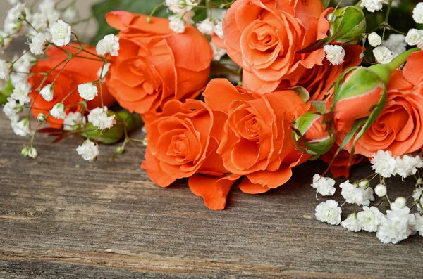 Roses on wooden background — Stock Photo, Image