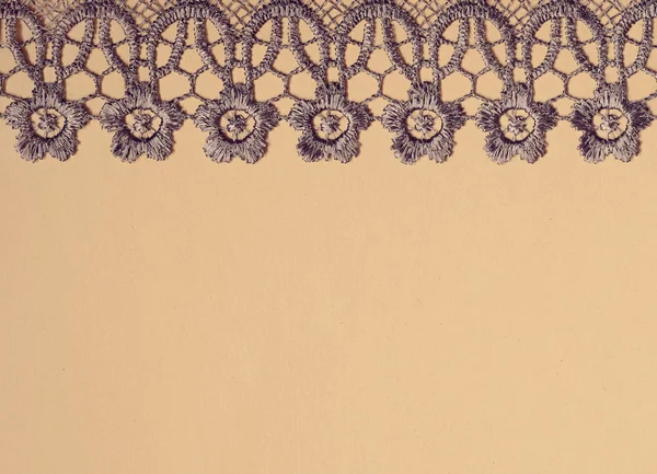 Gray lace on paper Royalty Free Stock Images