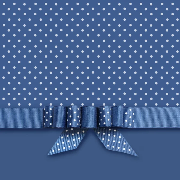 Bow on blue and white background — Stock Photo, Image