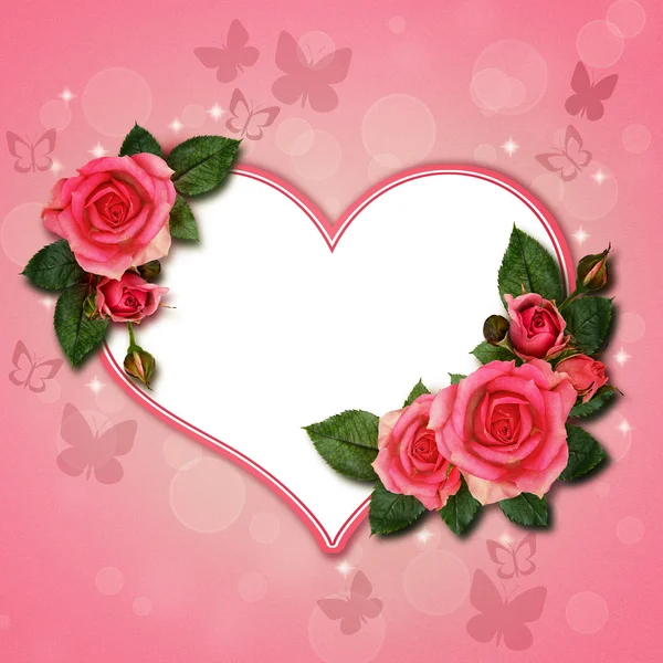 Roze bloemen en hart — Stockfoto