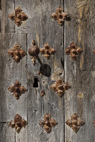Antique door with aged nails — Stock Photo, Image