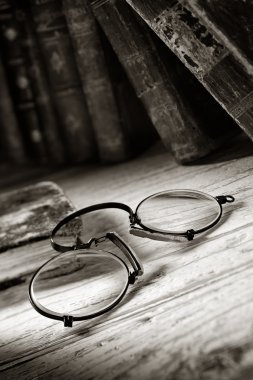 antique spectacles for an old reader clipart
