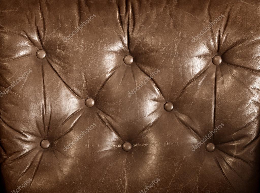 Aged brown leather upholstery Stock Photo by ©estudiosaavedra 46090641