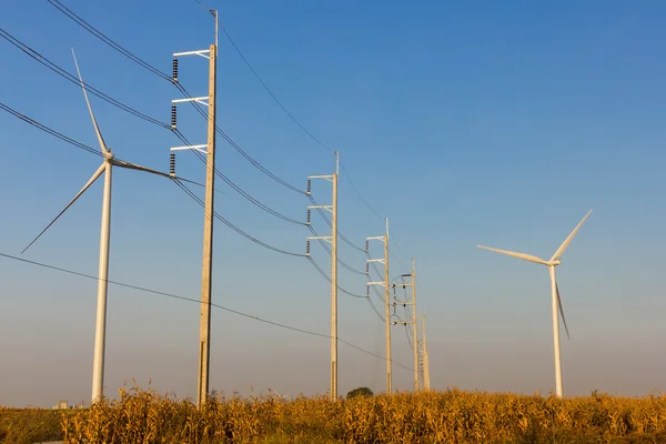 Wind turbines with transmission lines — Stock Photo, Image
